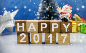 New Year 2017 Santa Sitting On Wooden Blocks Wallpaper 11994