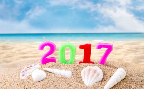 Happy New Year 2017 Candle In Beach Sand Wallpaper 11969